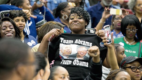 Simpatizantes de Obama durante un acto de la campaña para gobernadora de Stacey Abrams.