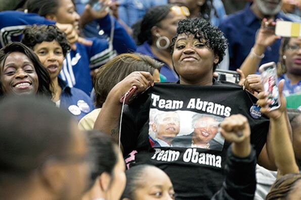 Simpatizantes de Obama durante un acto de la campaña para gobernadora de Stacey Abrams.