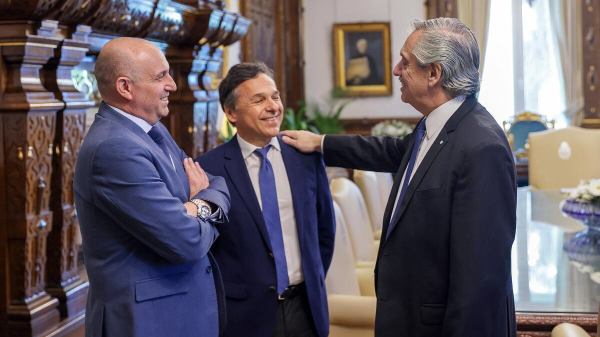 Alexis Guerrera, Diego Giuliano y Alberto Fernández.