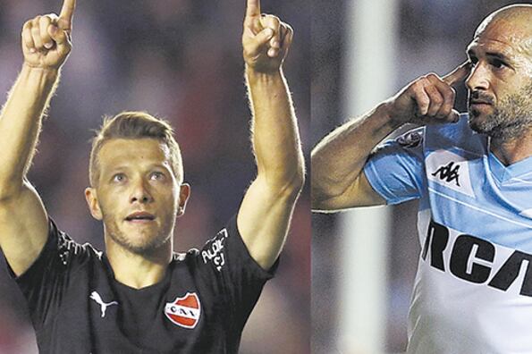 Nicolás Domingo, mediocampista del Rojo, y Lisandro López, delantero y capitán de Racing.