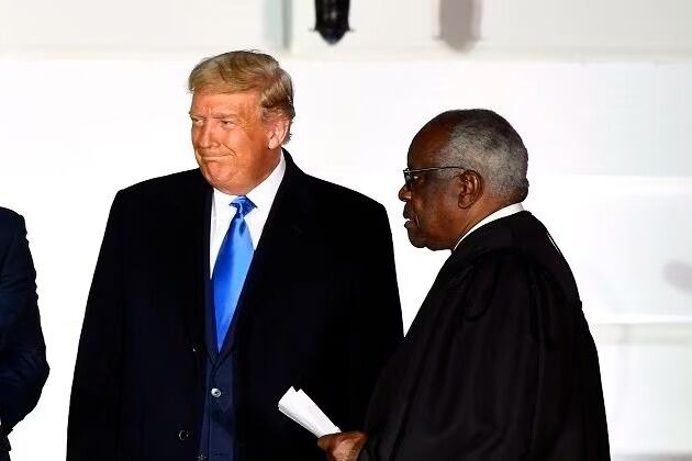 Thomas, junto con Donald Trump, cuando el millonario era presidente de EE. UU.