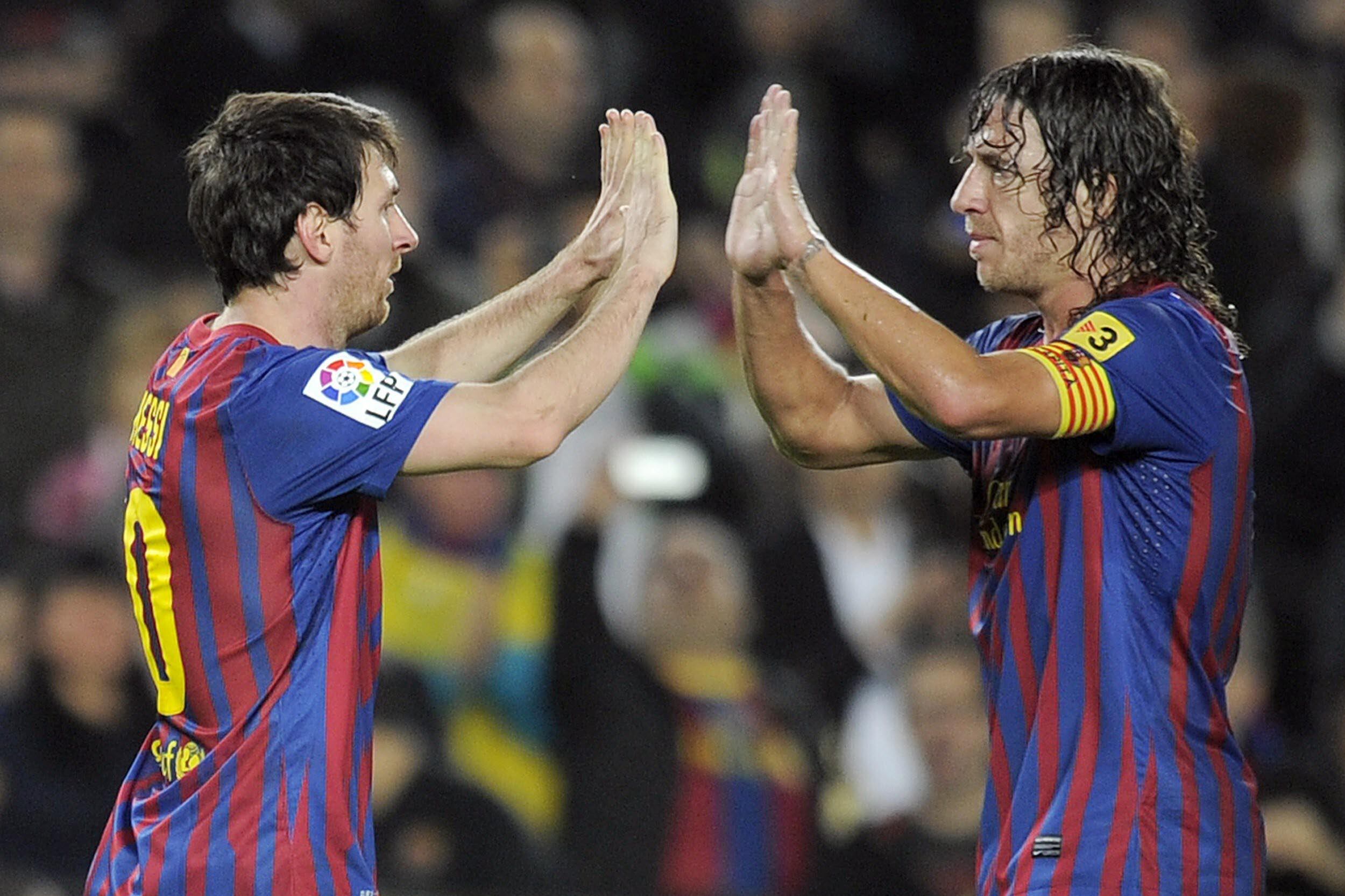 Messi y Puyol, durante los buenos tiempos culés.