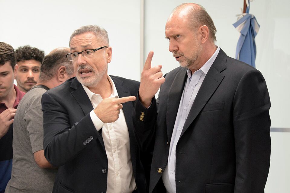 El ministro de Seguridad Marcelo Sain y el gobernador Omar Perotti.