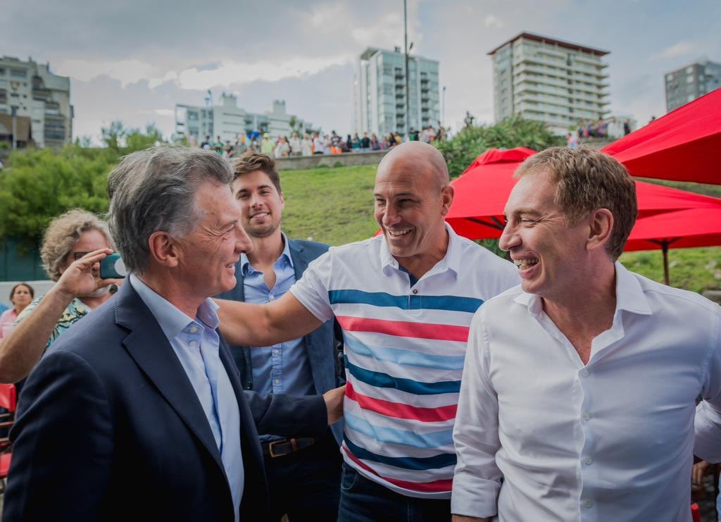 Martiniano Molina y Diego Santilli con Mauricio Macri. 