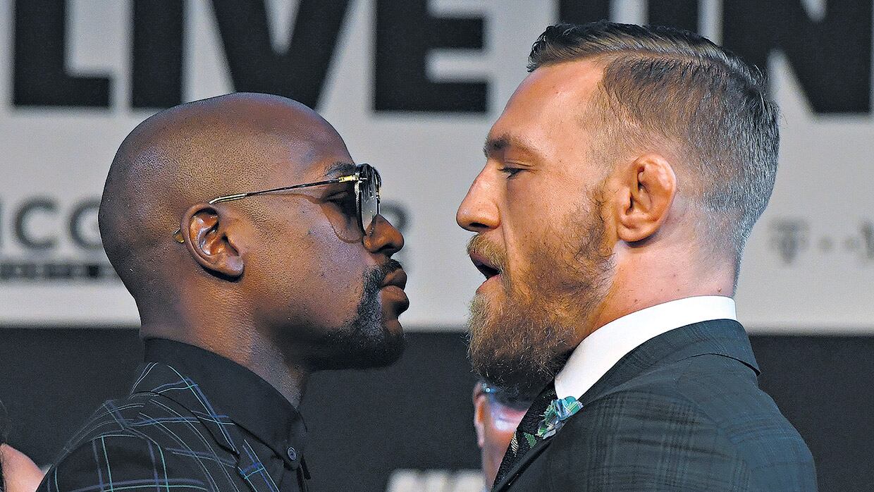 Mayweather y McGregor antes del combate que se estima recaudará 700 millones de dólares.