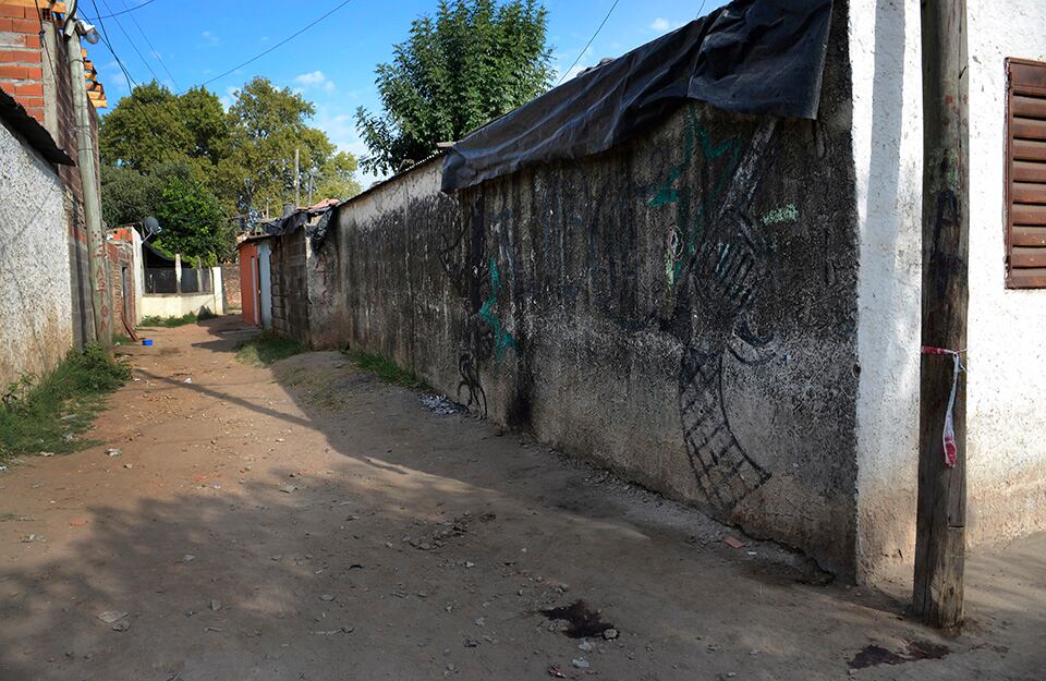 El ingreso al pasillo de Cerrillos al 3700, donde ocurrieron los crímenes