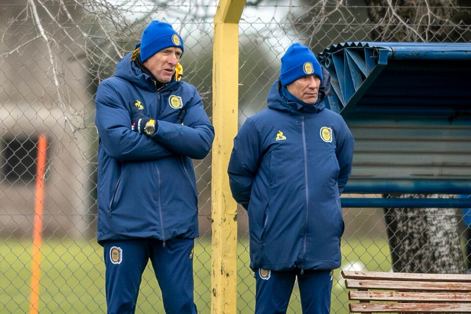 El secretario deportivo Federico Lussenhoff y Ariel Holan.