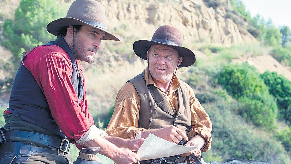 Joaquin Phoenix y John C. Reilly en The Sisters Brothers, del francés Jacques Audiard.