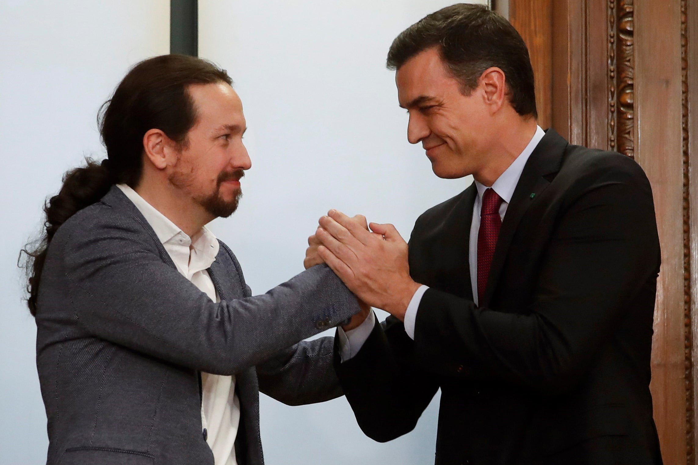 Pablo Iglesias, de Unidas Podemos y Pedro Sánchez, líder del PSOE.