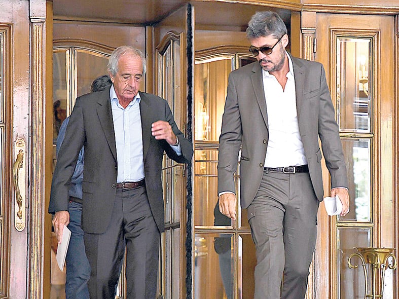 Rodolfo D’Onofrio y Marcelo Tinelli al salir de la reunión con ESPN.
