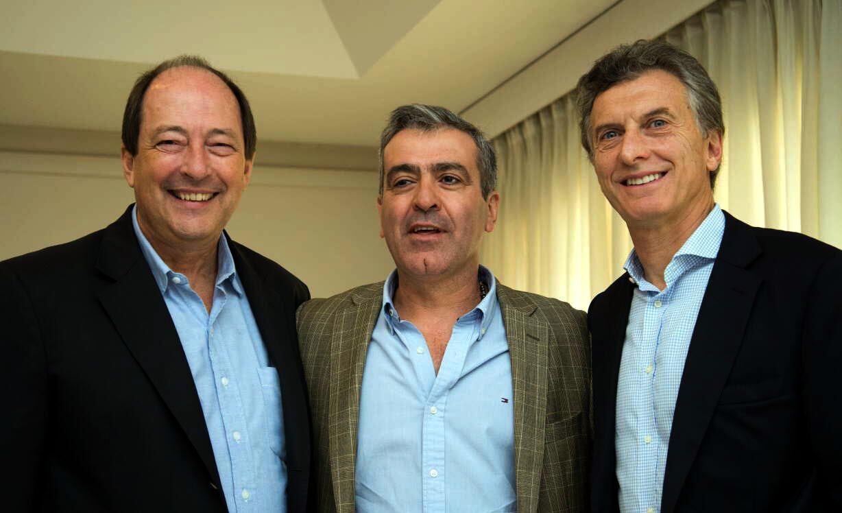 Cano con el presidente Macri y su correligionario Ernesto Sanz.