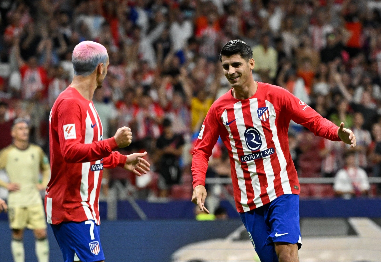 Morata celebra su gol con el francés Griezmann