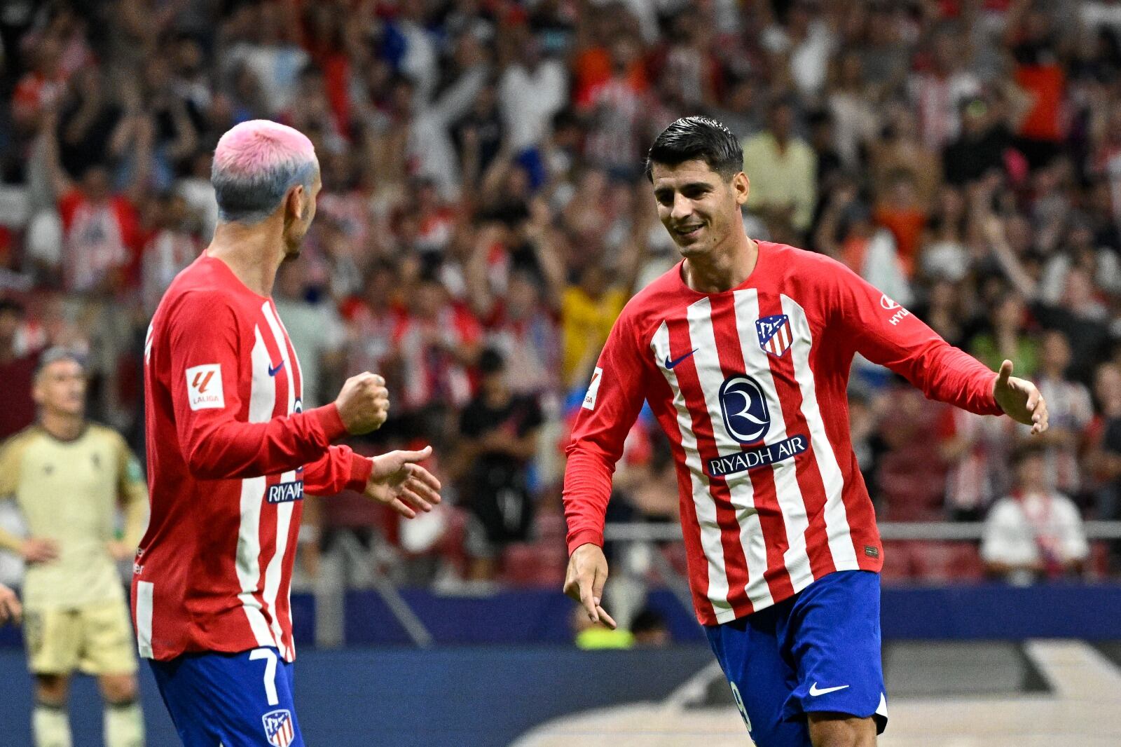 Morata celebra su gol con el francés Griezmann