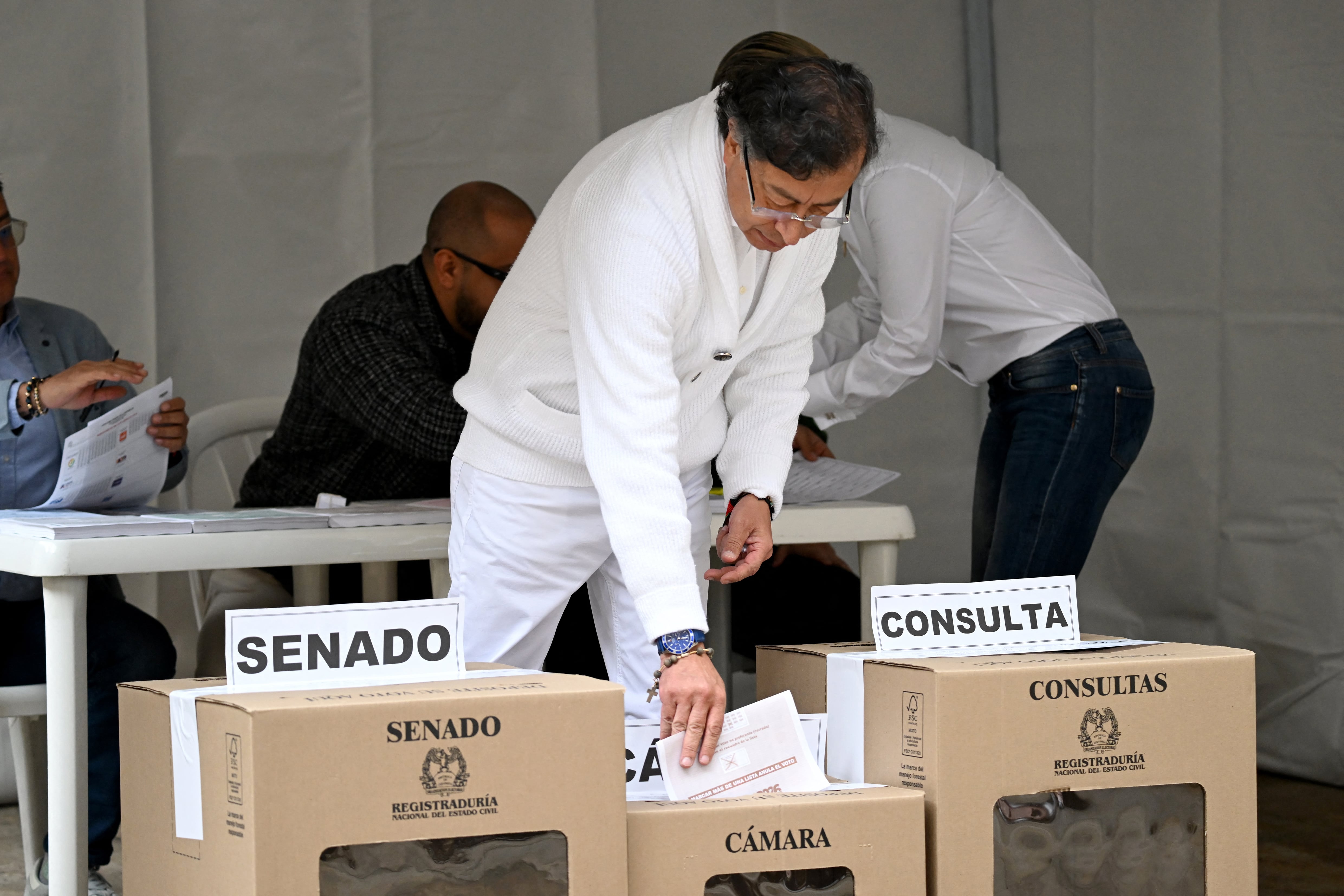 Colombia's President Gustavo Petro casts his vote at a polling station during legislative elections in Bogota on March 8, 2026. Colombians vote on March 8 in legislative elections that will shape the final months of left-wing President Gustavo Petro's term and test whether the country's once-powerful right wing is poised for a political comeback. (Photo by RAUL ARBOLEDA / AFP)