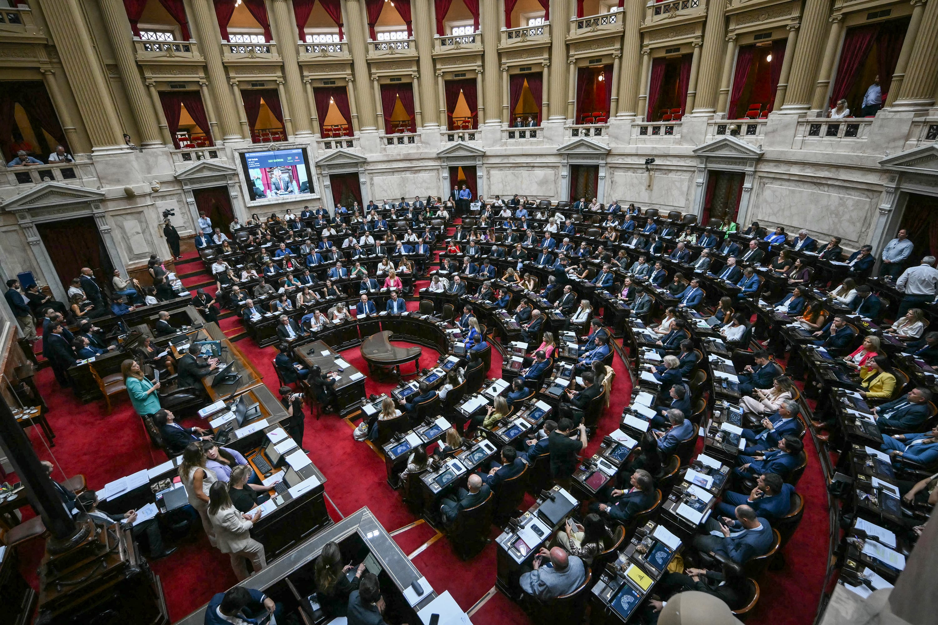 Members of the chamber of deputies attend a session to debate labor law reforms at the National Congress in Buenos Aires on February 19, 2026
