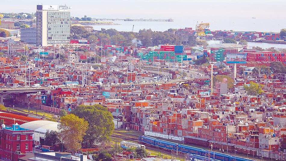 La reurbanización de la Villa 31 viene con una carta de subasta bajo la mesa.