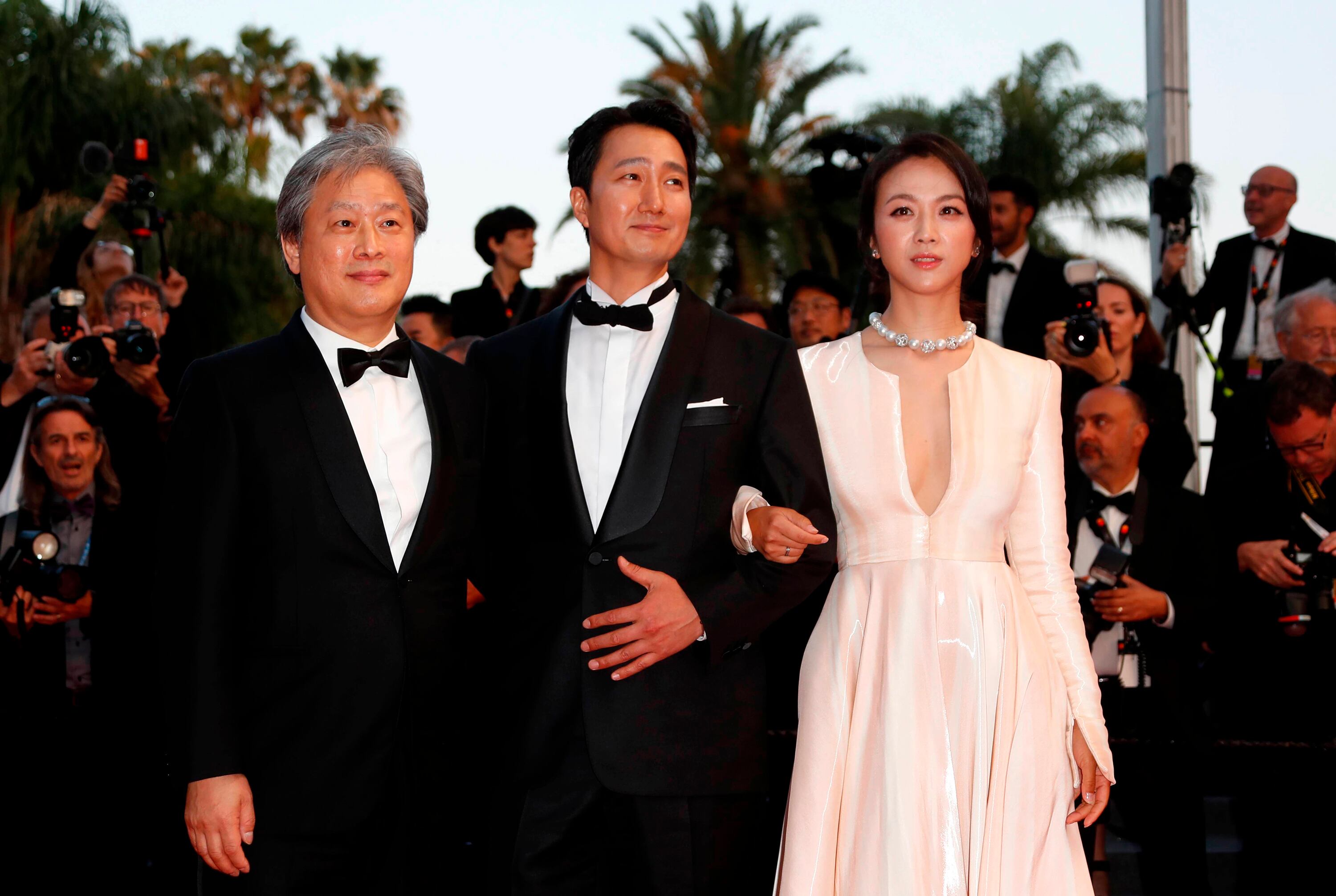 Park Chan-wook y sus intérpretes Park Hae-il y Tang Wei, en Cannes, en mayo pasado. 