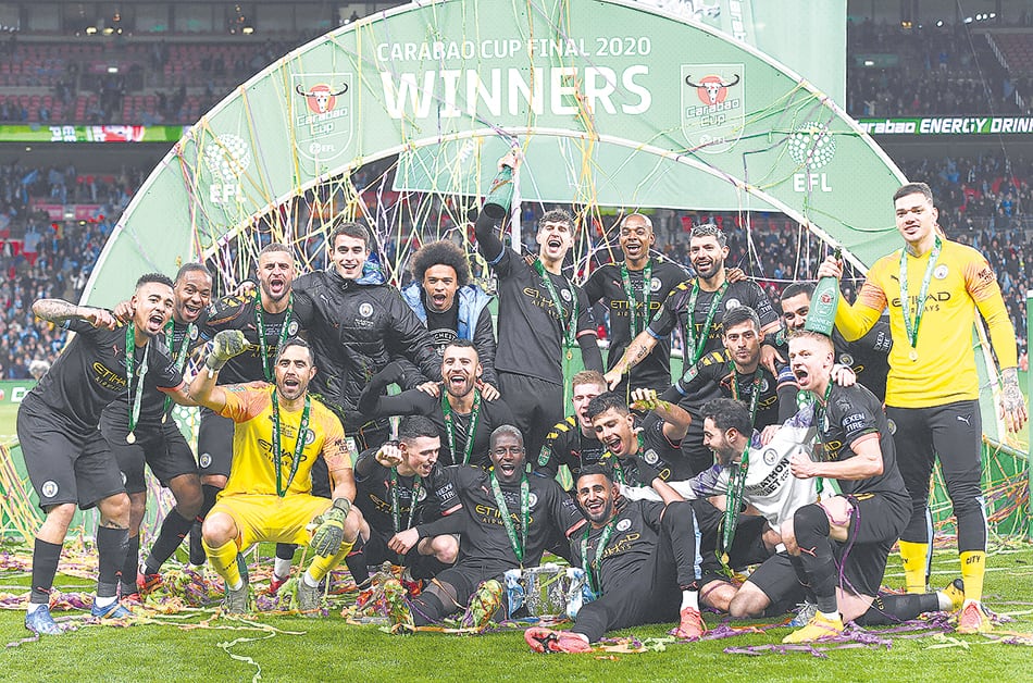 Los jugadores celebran la séptima Copa de la Liga en la historia del City.