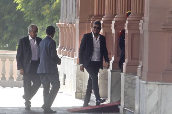 Rodolfo D'Onofrio y Marcelo Tinelli entrando a la Casa Rosada.