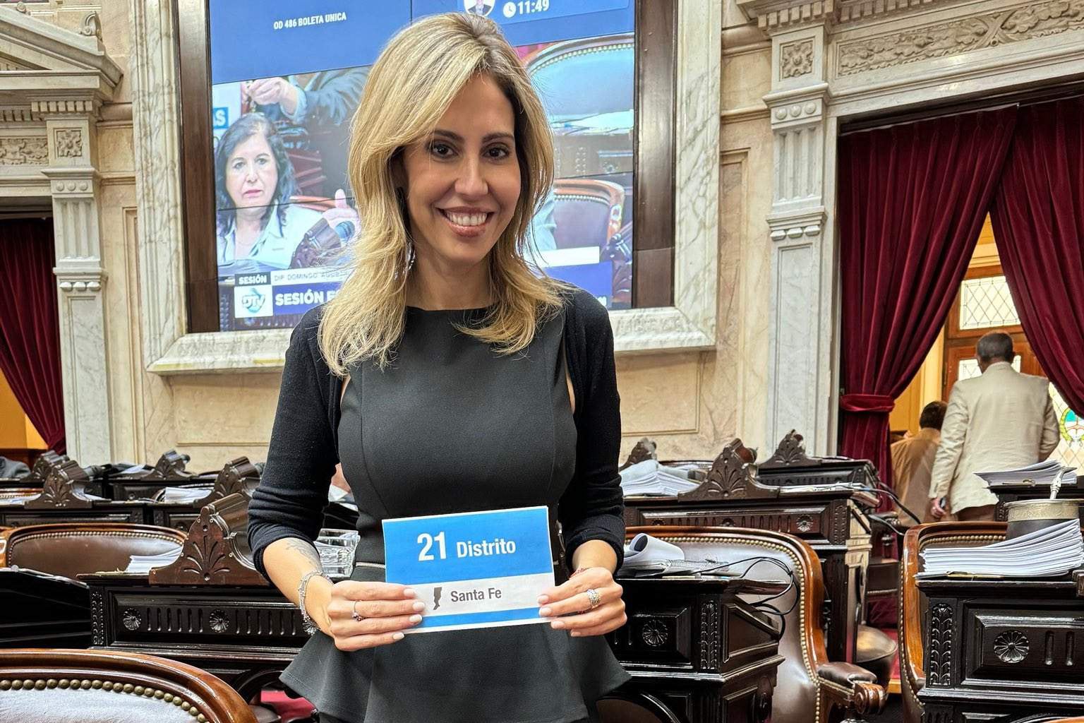 Romina Diez junto a Javier Milei.