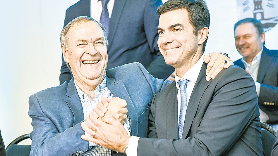 Juan Schiaretti y Juan Manuel Urtubey se mostraron ayer.