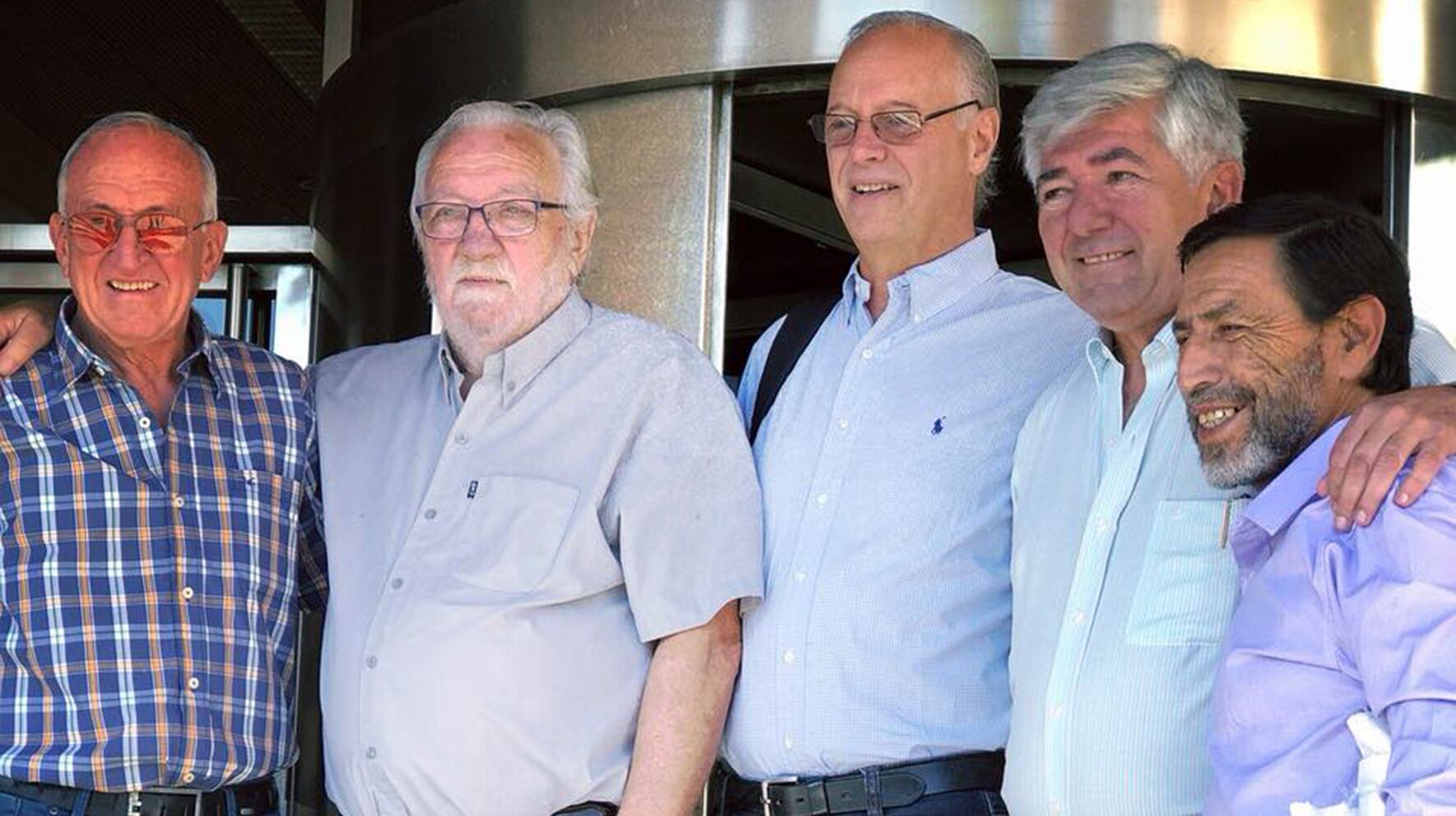 Paulón, Gollán y Seminara en el centro de la fotografía.