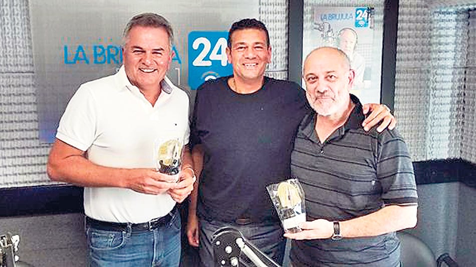 El intendente Gay, el conductor Scabuzzo y el subsecretario Margo.