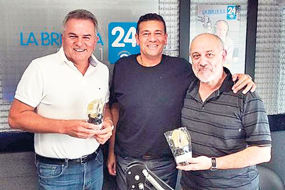 El intendente Gay, el conductor Scabuzzo y el subsecretario Margo.