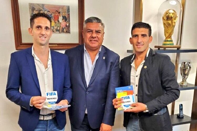 Tapia junto a Merlos (derecha) y Lamolina.