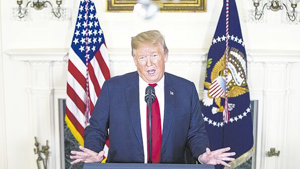 Trump presentó su plan migratorio ayer en el Salón Diplomático de la Casa Blanca.