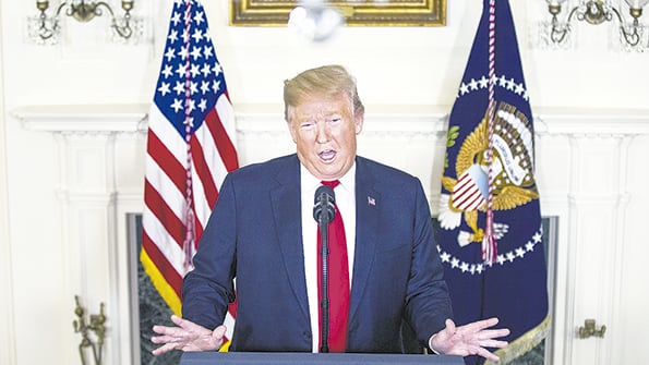 Trump presentó su plan migratorio ayer en el Salón Diplomático de la Casa Blanca.