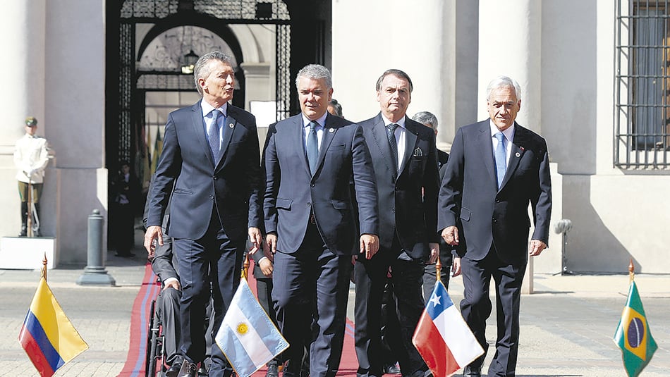 Macri, Duque, Bolsonaro y Piñera antes de la firma del documento.