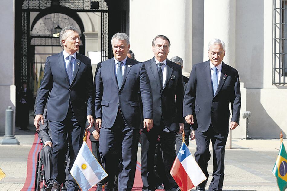 Macri, Duque, Bolsonaro y Piñera antes de la firma del documento.