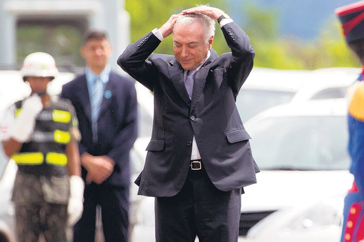 Temer ayer antes de reunirse con el Consejo Nacional de Defensa de Brasil.