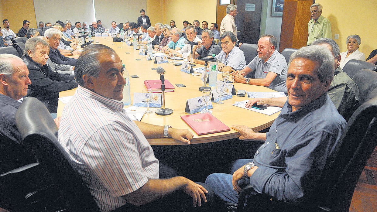 Héctor Daer, Juan Carlos Schmid y Carlos Acuña, los triunviros que representan a distintas líneas internas.