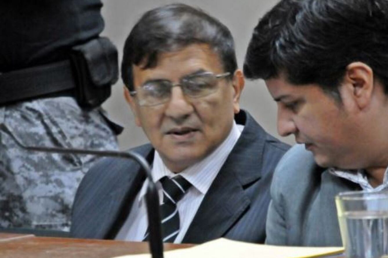 El ex juez Reynoso (izquierda)