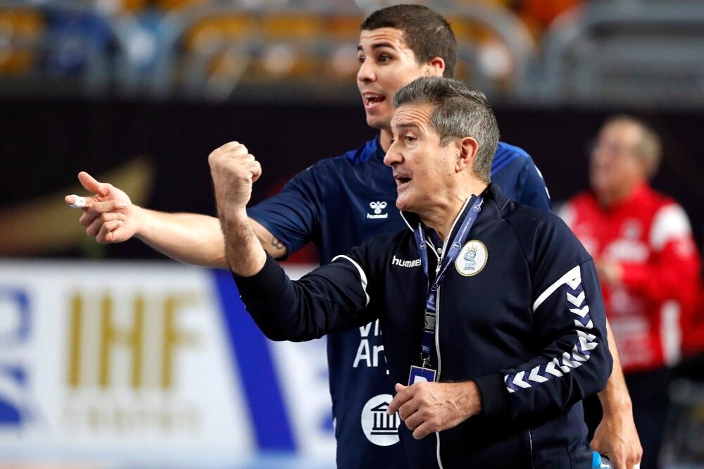 Diego Simonet y el entrenador Manuel Cadenas.