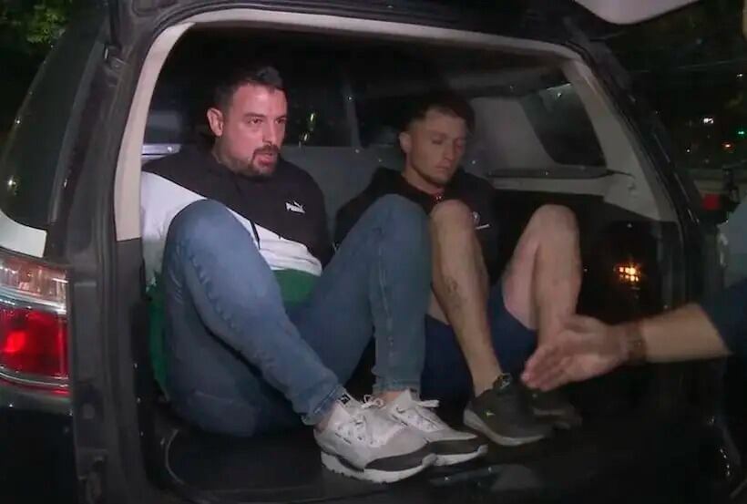 Los hinchas de San Lorenzo detenidos, al momento del traslado