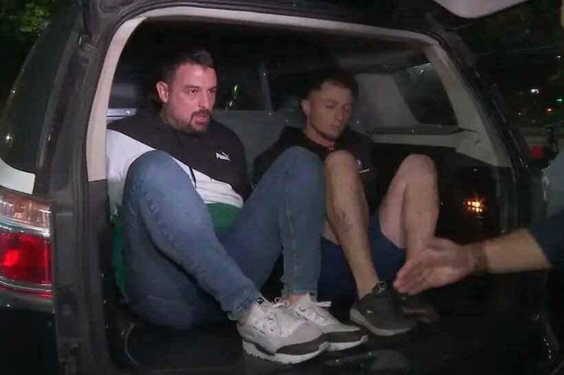 Los hinchas de San Lorenzo detenidos, al momento del traslado