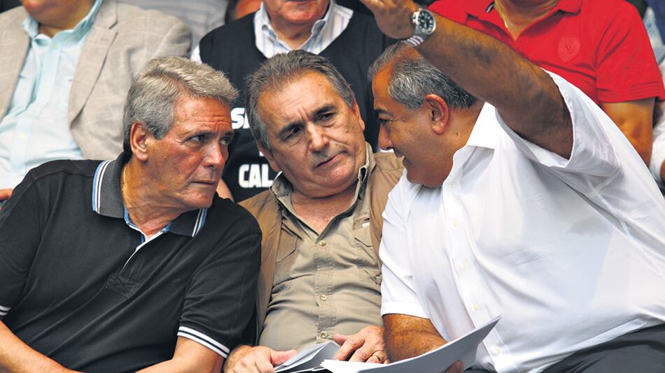 El triunvirato que lidera la CGT: Acuña, Schmid y Daer.