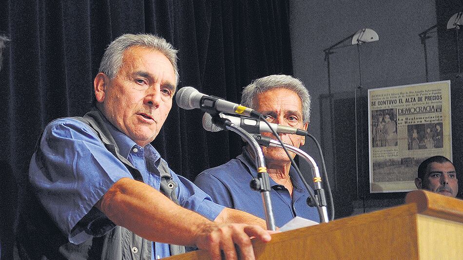 Juan Carlos Schmid y Carlos Acuña, triunviros de la CGT.