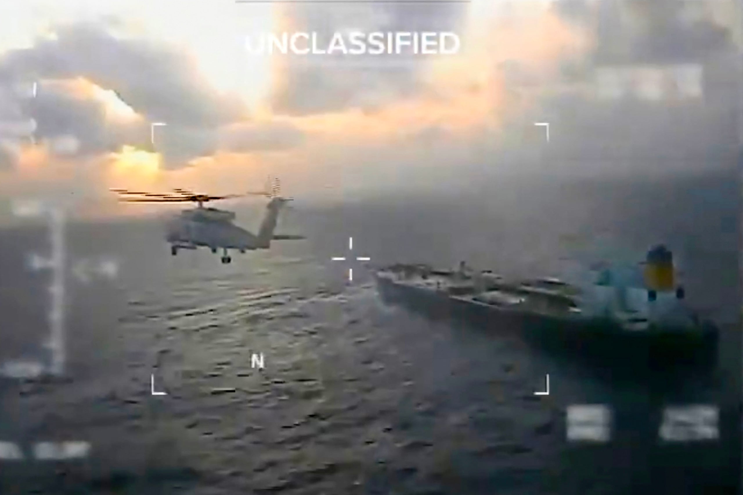 This screen grab taken from a video posted on the X account of US Secretary of Homeland Security Kristi Noem shows a US Coast Guard aircraft flying over a crude oil tanker, last docked in Venezuela, before apprehending it on December 20, 2025. The United States "apprehended" an oil tanker off Venezuela on December 20, the latest salvo in a pressure campaign against Caracas, the US government said.
It was the second time in two weeks that US forces have interdicted a tanker in the region, and comes days after President Donald Trump announced a blockade of "sanctioned oil vessels" heading to and leaving Venezuela. (Photo by Handout / US Secretary of Homeland Security Kristi Noem's X account / AFP) / RESTRICTED TO EDITORIAL USE - MANDATORY CREDIT "AFP PHOTO / US SECRETARY OF HOMELAND SECURITY KRISTI NOEM'S X ACCOUNT " - NO MARKETING NO ADVERTISING CAMPAIGNS - DISTRIBUTED AS A SERVICE TO CLIENTS