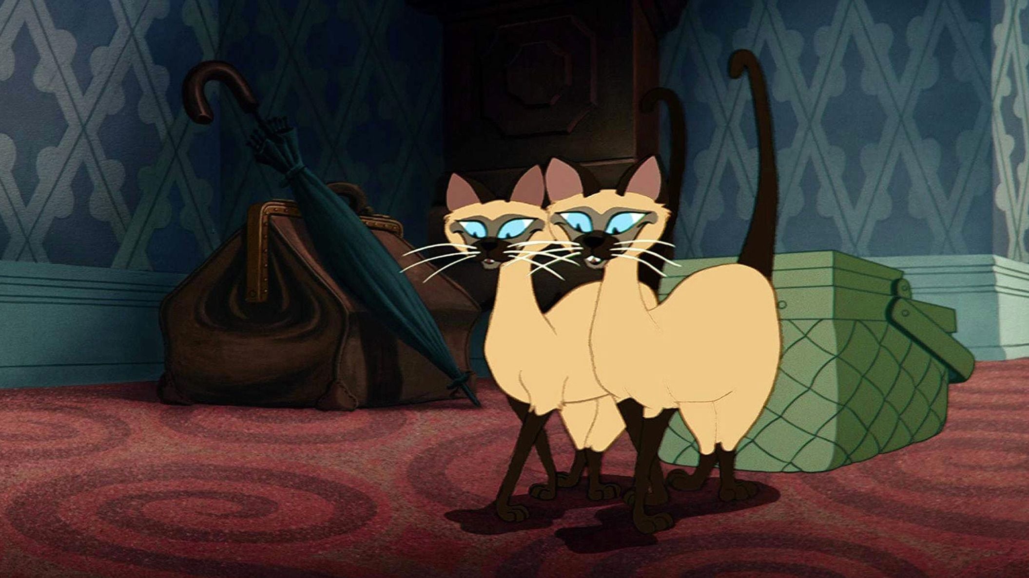 Los siameses en el film animado de 1955.