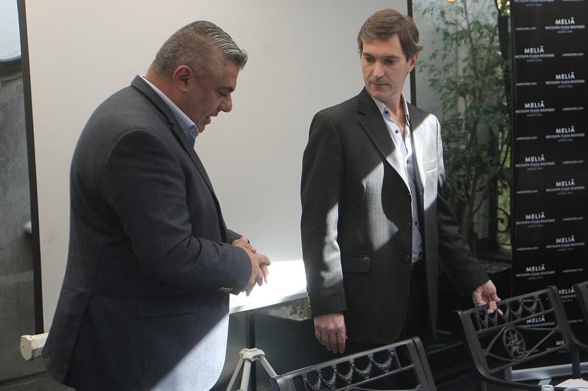 Claudio "Chiqui" Tapia (AFA) y Mariano Elizondo (SAF). 