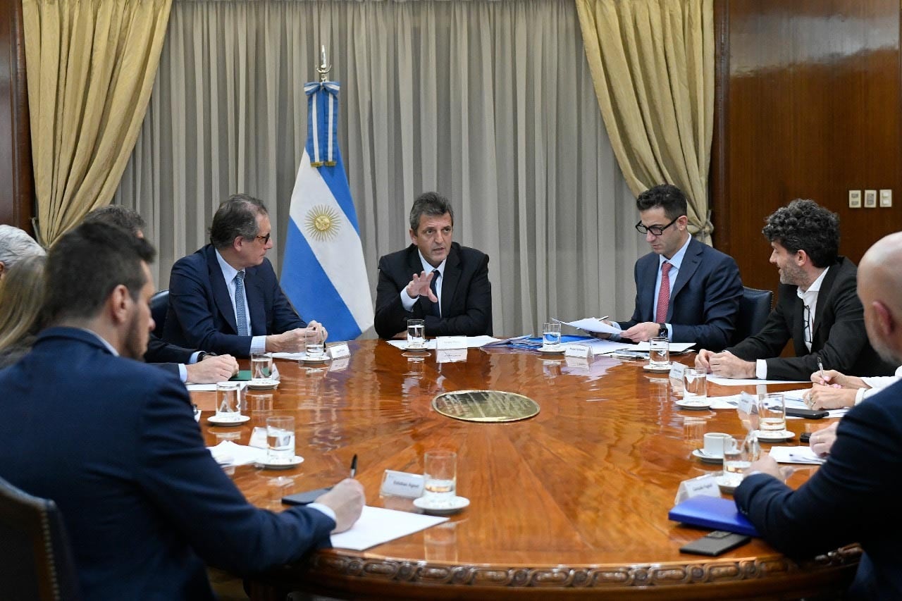 Massa y Tombolini, en uno de tantos encuentros con líderes empresarios en busca de un acuerdo