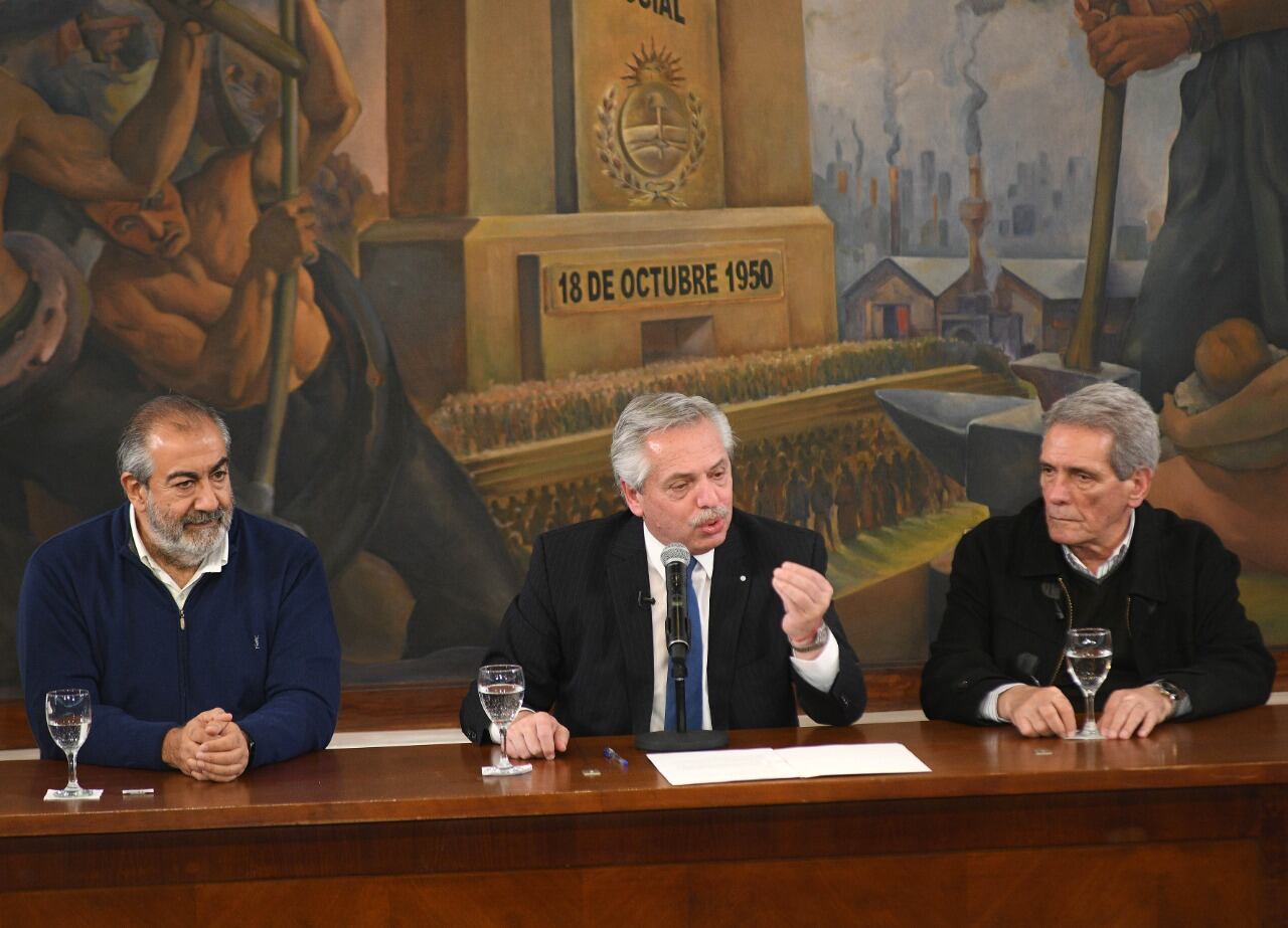 Los tríunviros Héctor Daer y Carlos Acuña entre los que participaron de la cena con el Presidente Fernández.