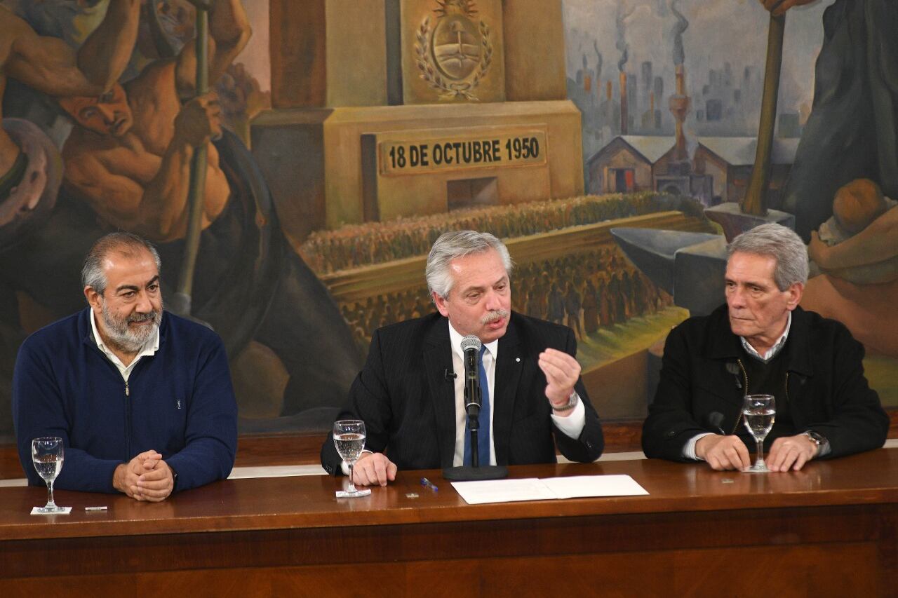 Los tríunviros Héctor Daer y Carlos Acuña entre los que participaron de la cena con el Presidente Fernández.