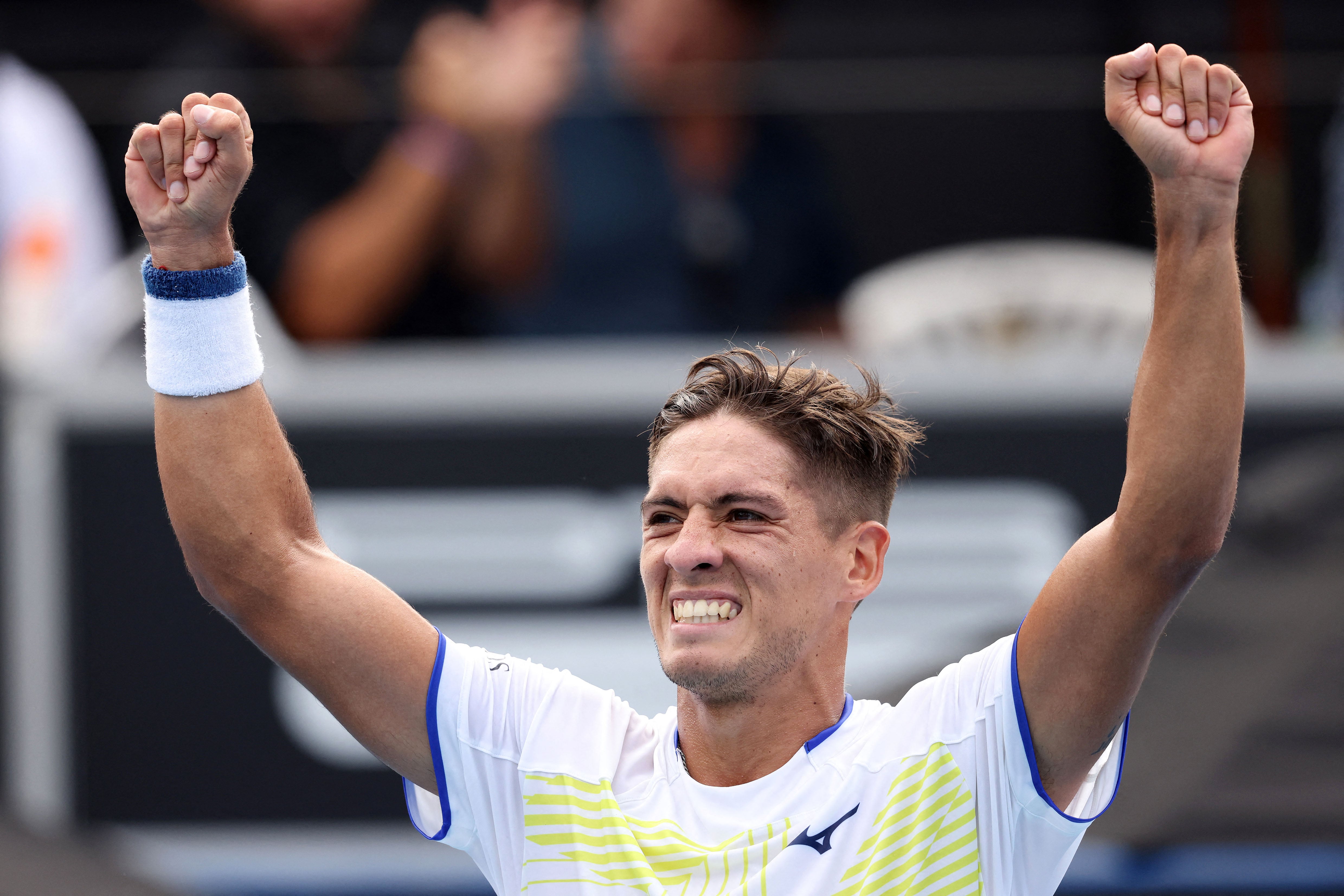 Argentina's Sebastian Baez celebrates his win against USA's Marcos Giron during their men's singles semi-final match at the ATP Auckland Classic tennis tournament in Auckland on January 16, 2026. (Photo by Michael Bradley / AFP)
