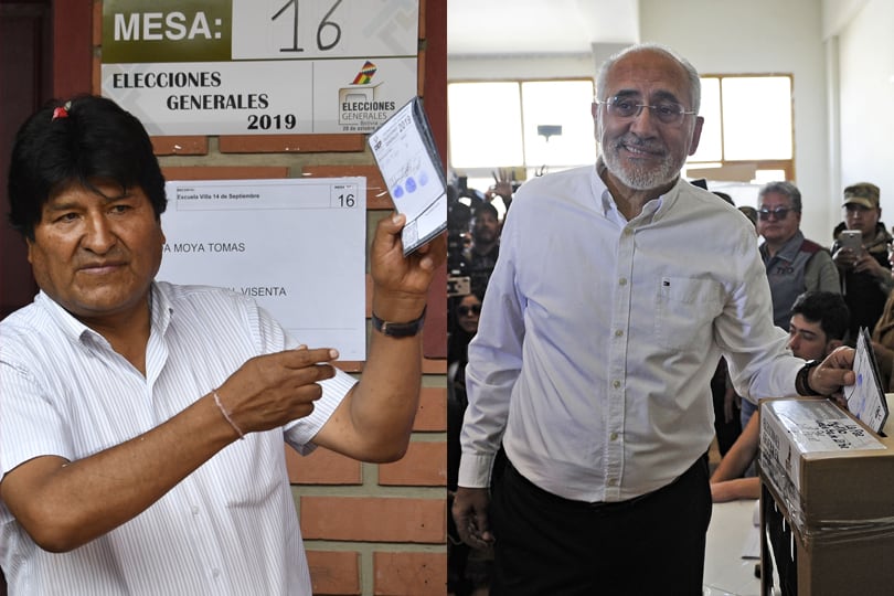 Evo Morales y el opositor Carlos Mesa; faltaba escrutar aún el 16 por ciento de los votos.