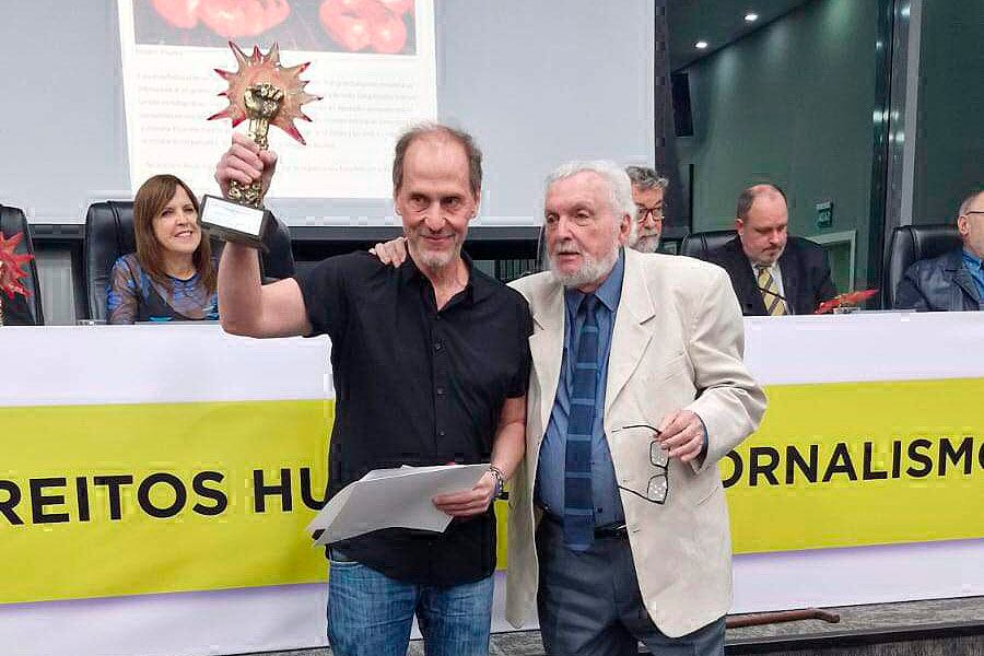 Veiga y el presidente del Movimiento de Justicia y Derechos Humanos de Brasil, Jair Kirschke.